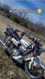 Tüfek ve motosikleti sanal medyada 'ikisi de ruhsatsız' notuyla paylaşan 2 kişiye gözaltı