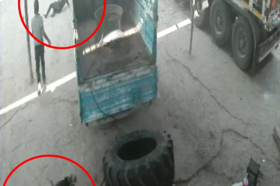 Hava basılan traktör lastiği patladı, 2 işçinin yaralandığı o anlar kamerada