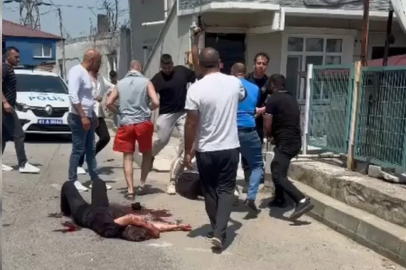 Eşini sokak ortasında bıçaklayan şüpheliye linç girişimi